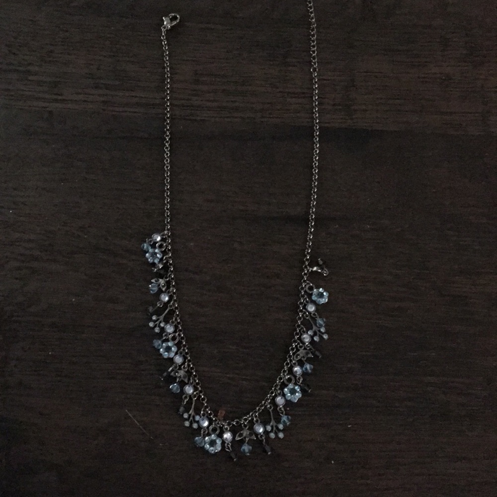 Adjustable necklace with dangling blue charms